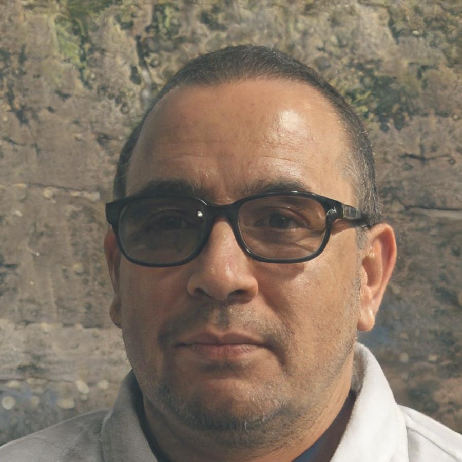 Portrait of senior financial advisor with extensive teaching experience